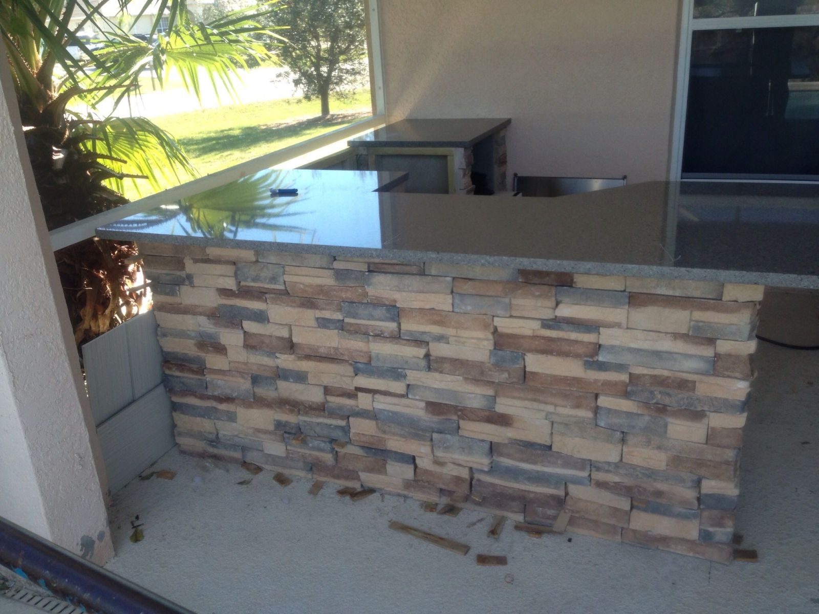 Outdoor Kitchen Installed on Existing Lanai - Olde Florida Contracting