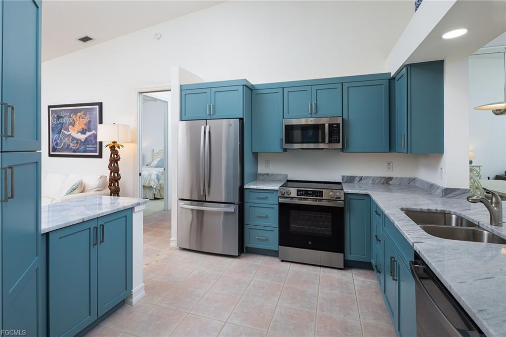 Bright, Modern, Coastal Inspired Kitchen Remodel in Naples, FL by Olde Florida Contracting, Inc. project photo 5